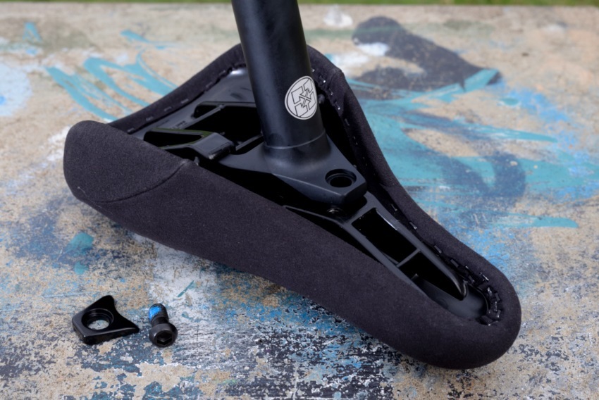 Adjusting the angle of the seat is accomplished by using or not using the included wedge.